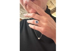 white gold ring with oval natural sapphire and diamonds